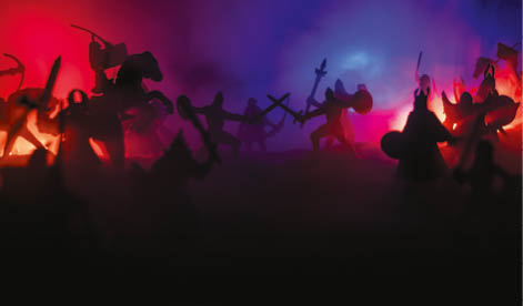 Medieval battle scene. Silhouettes of figures as separate objects, fight between warriors at night. Creative artwork decoration. Foggy background. Selective focus