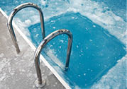 Ice swimming theme. Steps in the frozen blue pool ice-hole