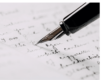 fountain pen on paper with ink text closeup