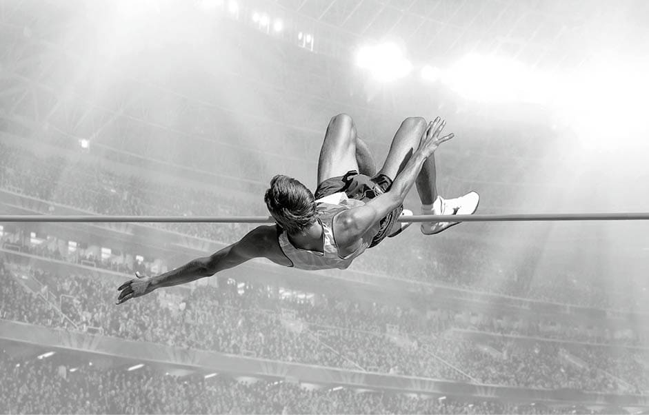 Athlete in action of high jump.